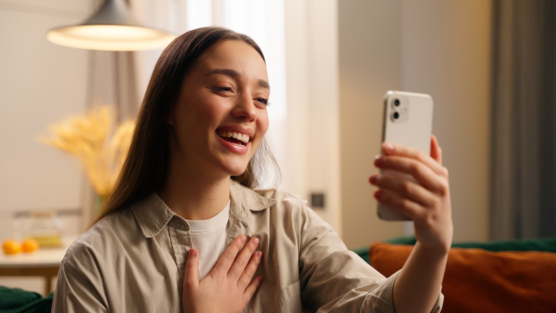 A woman moved to tears while watching her Ovation video